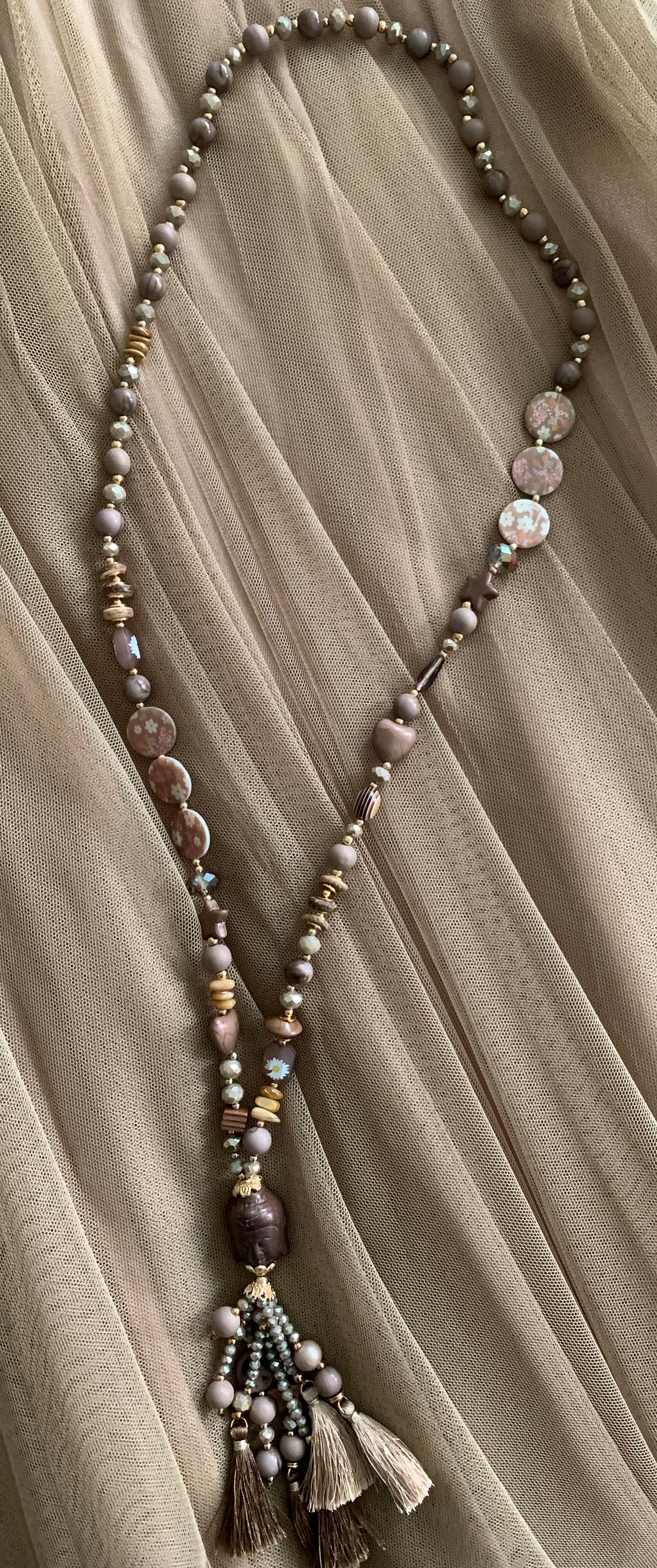 Kette Buddha braun; €29,90 statt €49,90; „ Im Black-Friday-Outlet“ ein super extravagantes Accessoire